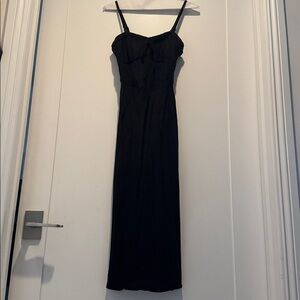 Black this strap dress with boning like a corset dress. Used but good condition.